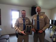 Photos of Sheriffs receiving reward