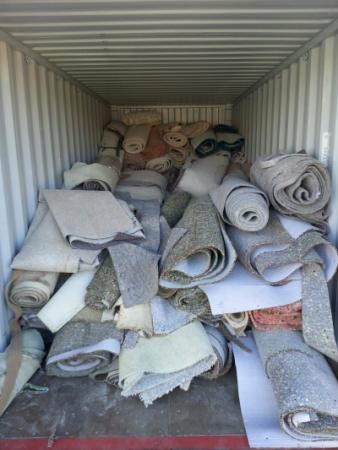 Carpet in a dumpster
